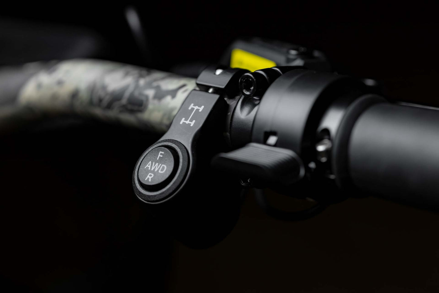 Close-up of Rambo Bike Megatron 4.0 AWD Electric bikes right handlebar with all-wheel drive controls, throttle and brake lever