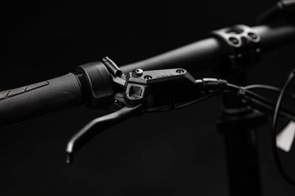 Close-up of the Rambo Bikes RANGER eBike handlebar with brake lever and grip, showcasing rugged design.