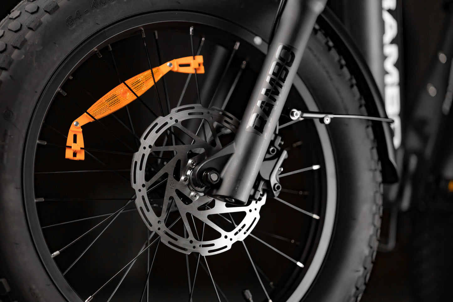Close-up of Rambo Bikes RANGER folding eBike front wheel with fat tire and disc brake.