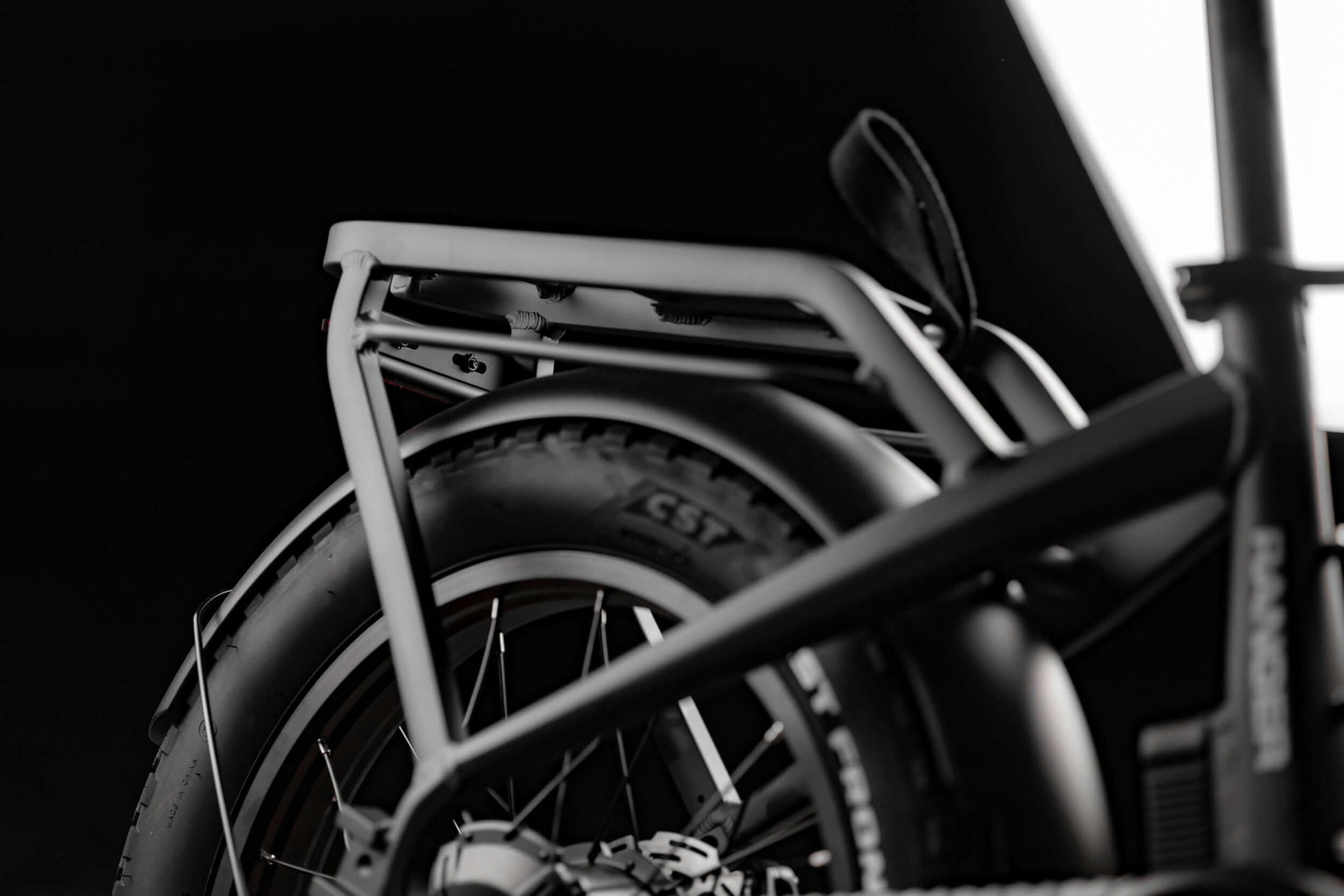 Close-up of Rambo Bikes RANGER folding eBike showing fat tires and rear rack design.