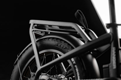 Close-up of Rambo Bikes RANGER folding eBike showing fat tires and rear rack design.