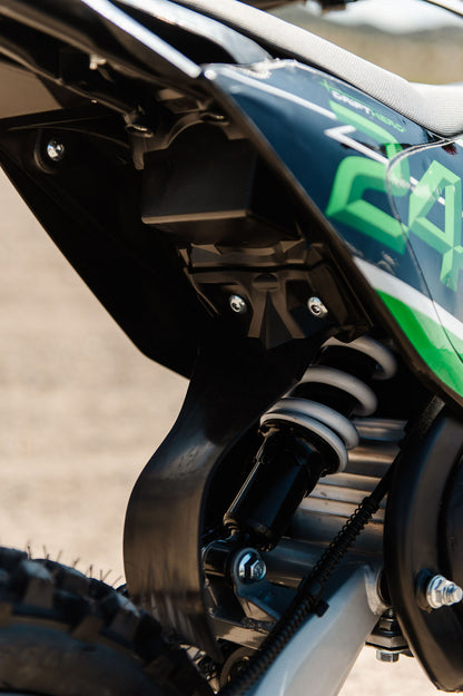 Close-up of rear suspension spring on Drift Hero USA 2500W Electric Dirt Bike