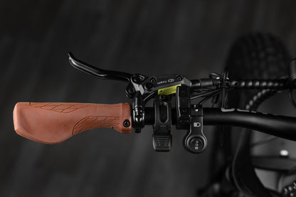 Close-up of Rambo Bike Hellcat 2.0 AWD Electric Bikes left handlebar with brake lever, throttle, headlight control and speed shifter