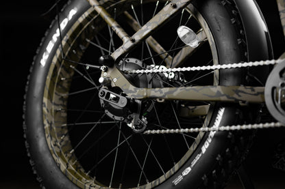 Close-up of Rambo Bikes Krusader 3.0 All-wheel drive Electric Bike rear motor hub and rear wheel on black background