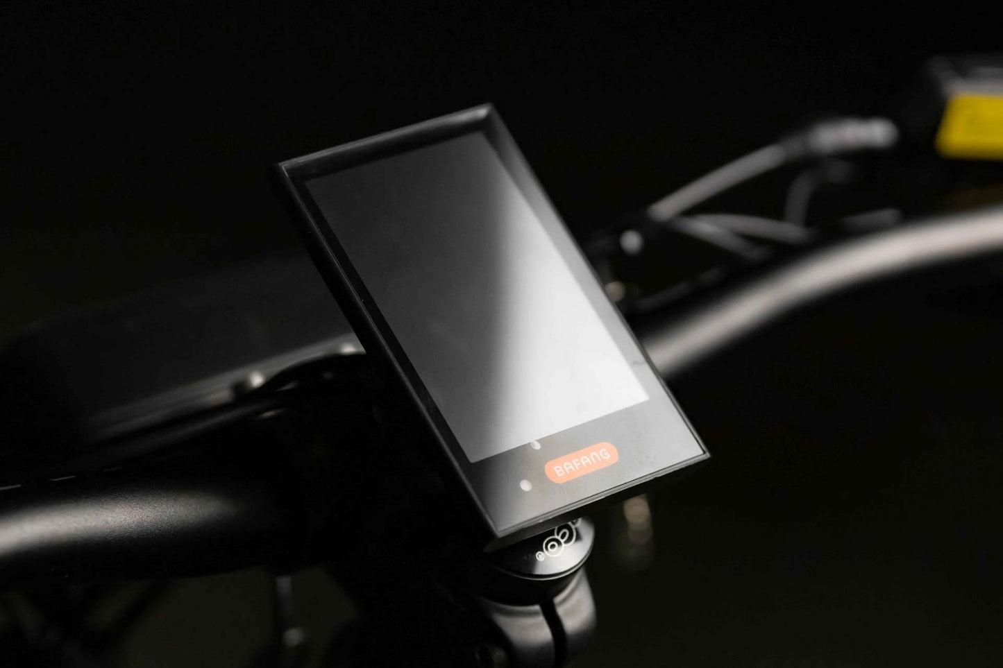 Close-up of a Rambo Bikes REBEL 2.0 Electric Bikes LCD screen on dark background