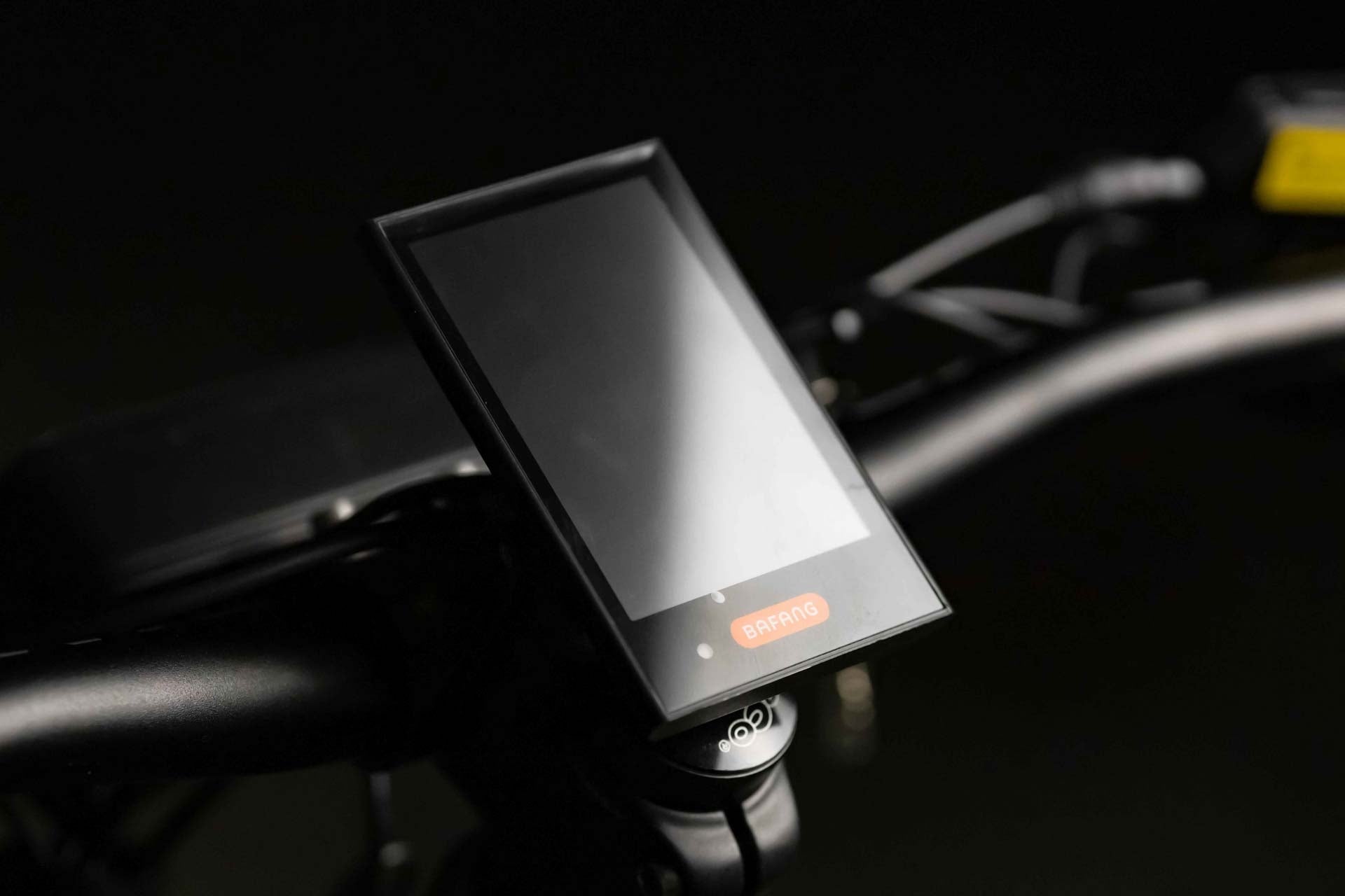 Close-up of a Rambo Bikes REBEL 2.0 Electric Bikes LCD screen on dark background