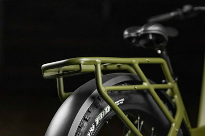 Close-up of Rambo Bikes REBEL 2.0 Electric Bikes rear wheel and rear rack on dark background
