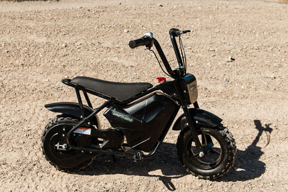 Drift Hero USA 250W Mini Electric Bike on a gravel surface