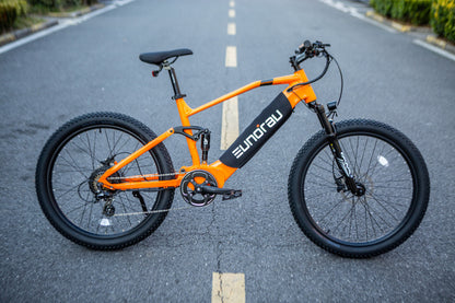 Eunorau Defender electric fat tire bike side profile view on the road with full suspension and fat tires.
