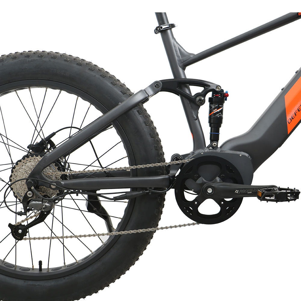 Eunorau Defender-S electric bike close-up of mid-frame showing suspension, drivetrain, and rear wheel
