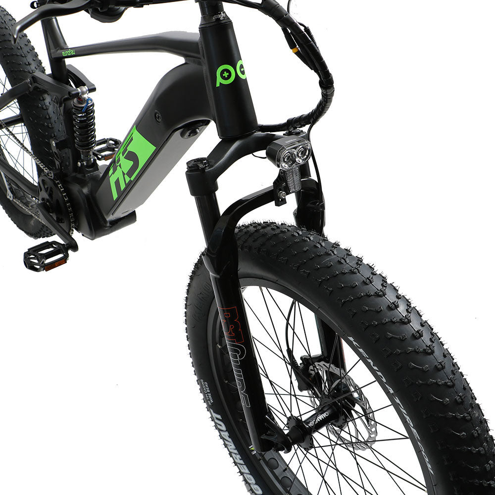 Eunorau Fat-HS electric fat tire bike front close-up view showing handlebars, brake levers, and fat tires.
