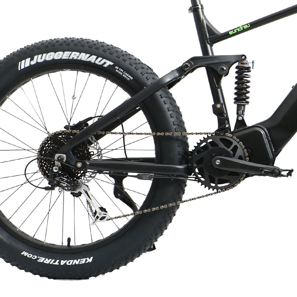 Eunorau Fat-HS electric fat tire bike close-up of rear suspension, drivetrain, and fat tire.
