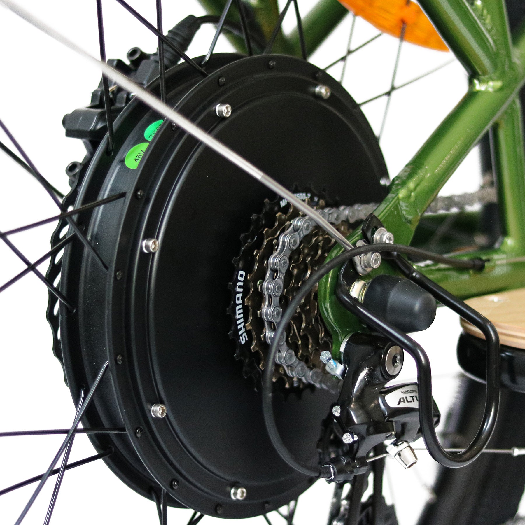 Close-up of a Eunorau Max-Cargo 14AH wheel with a Shimano gear system on a green electric bike.