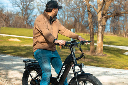 Person riding an Rambo Bikes SAVAGE 2.0 Electric Bike in a park