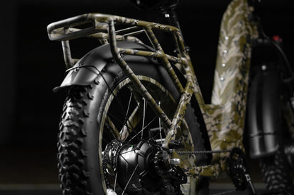 Close-up of Rambo Bikes Krusader 3.0 All-wheel drive Electric Bikes rear rack and rear wheel on black background