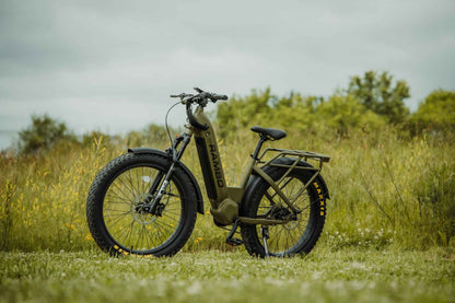 Side view of Rambo Bikes REBEL 2.0 Electric Bike in a grass field