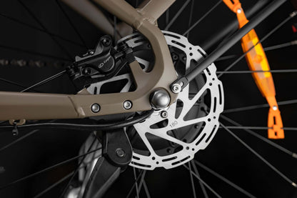 Close-up of Rambo Bikes SAVAGE 2.0 Electric Bikes brakes system on dark background