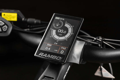 Digital display on a Rambo Bikes SAVAGE 2.0 Electric Bikes handlebar against a dark background