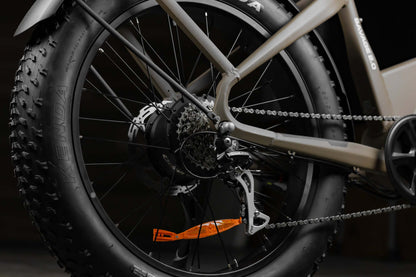 Close-up of Rambo Bikes SAVAGE 2.0 Electric Bikes gear system and rear wheel on dark background